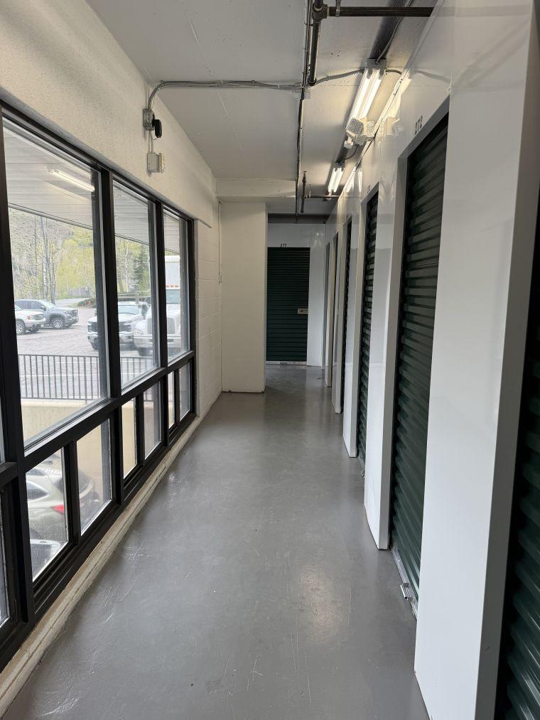Indoor climate-controlled storage units on an upper floor at our Avon storage facility