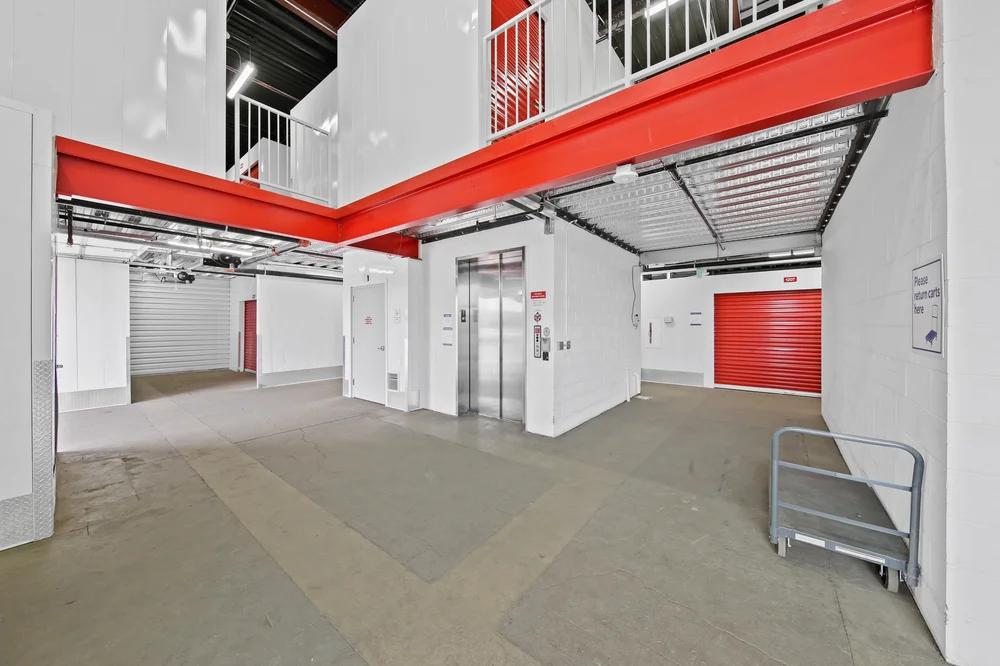 Interior photo of the Grape Street storage units in Denver, showing the well-lit, wide aisles.