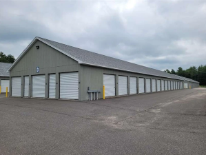 Drive-up storage units with ground-level access