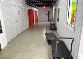 Carts and dollies in a hallway with climate-controlled storage units at 5900 US Hwy 1 in Rockledge, FL