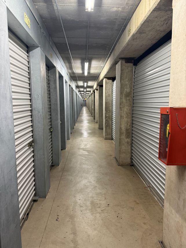 A hallway of climate-controlled storage units