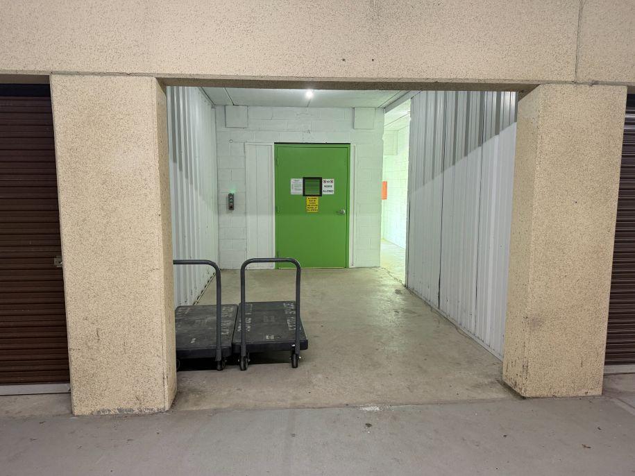 Carts and dollies stationed in front of the lift elevator