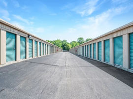 Wide drive aisle with drive-up storage units on either side