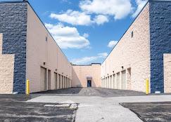 Wide drive aisle with outdoor drive-up units in West Chicago at 28W725 Garys Mill Rd