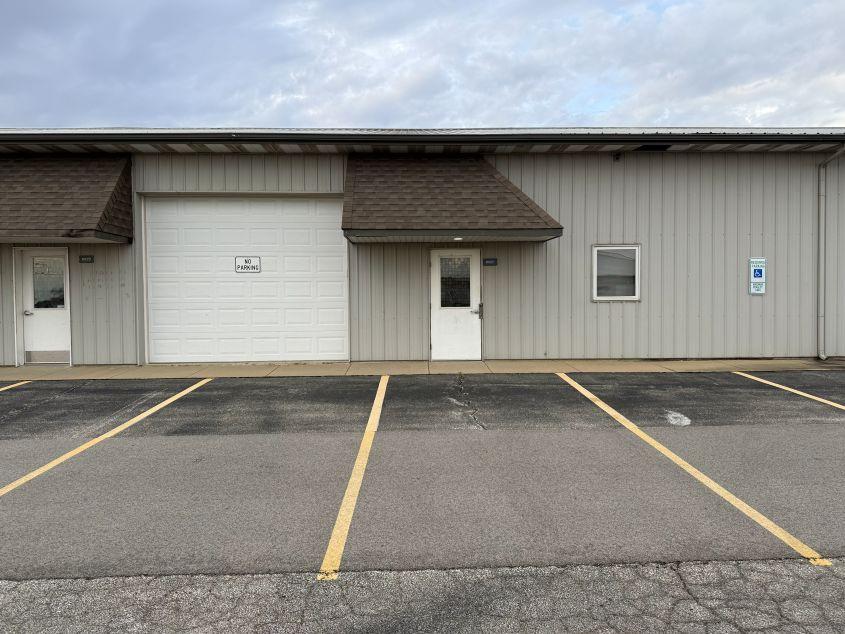 Close up of a commercial storage unit in Champaign, IL with an office space and workshop